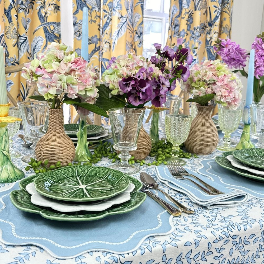 Blue leaves tablecloth and embroidered placemats in gingham