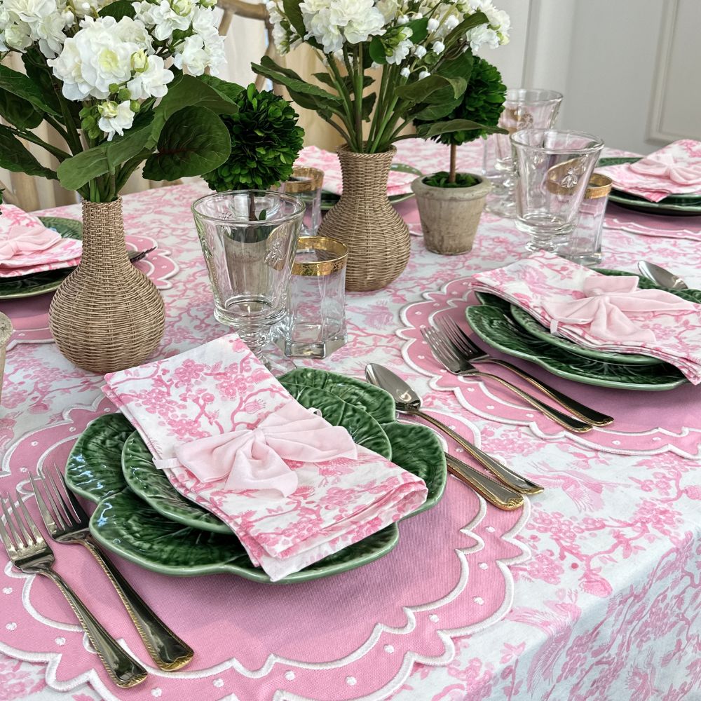 pink toile tablecloth with pink luxury embroidered placemats and pink velvet napkin bows