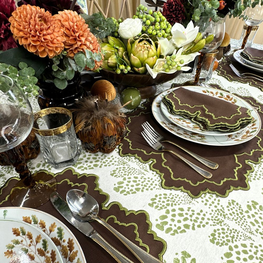 hand block printed tablecloth the Kelli in sage with the Lillian luxury embroidered placemats and napkins in sage with gold velevet bows. 