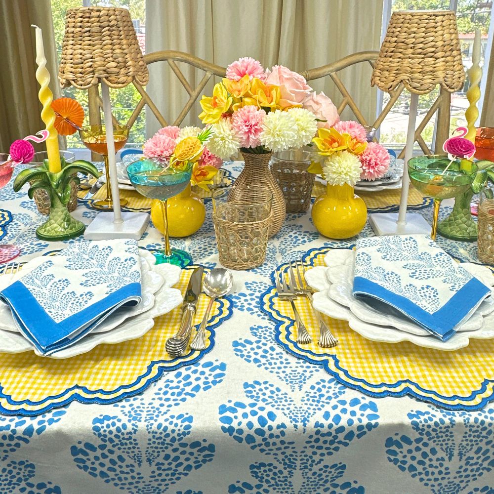 Cabana blue hand block print tablecloth with matching yellow gingham placemats with blue embroidery
