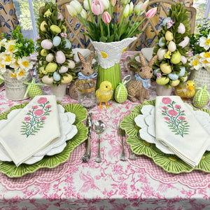 Pink gingham placemats on Easter table