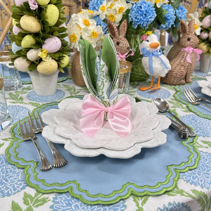 Blue and green luxury placemat on floral tablecloth